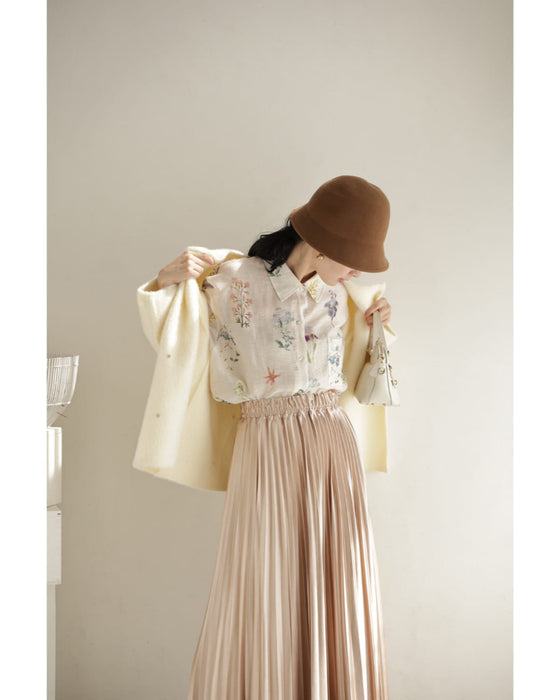 肌触り柔らかな花集めシアーシャツトップス