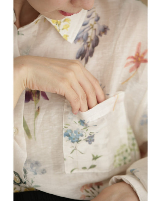 肌触り柔らかな花集めシアーシャツトップス