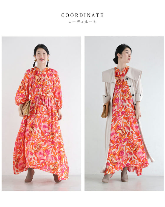 エネルギッシュな色を纏うフラワーパターンロングワンピース（紐リボン付き）