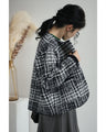 重ね着風な手元のチェックニットジャケット