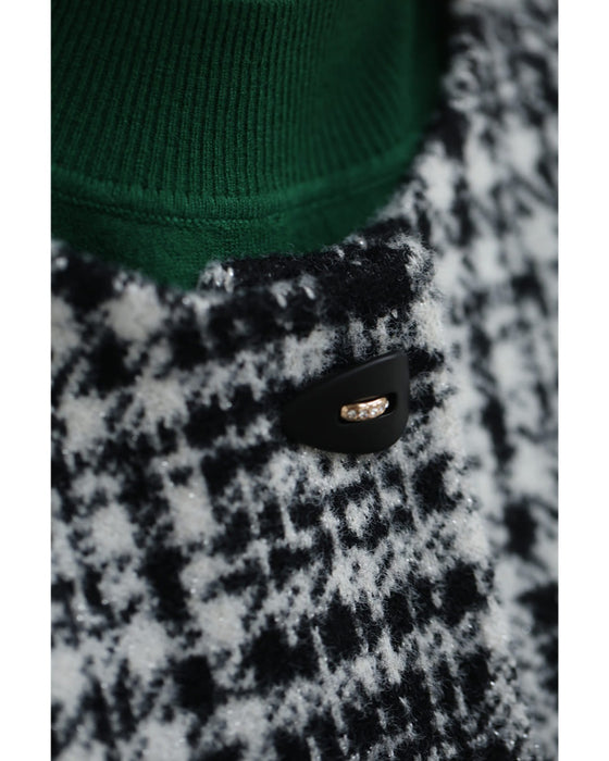 重ね着風な手元のチェックニットジャケット