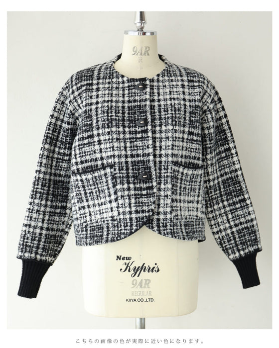 重ね着風な手元のチェックニットジャケット