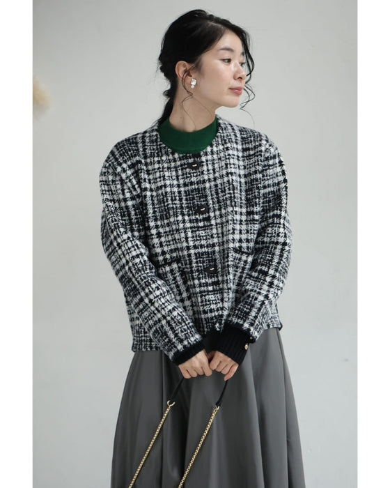 重ね着風な手元のチェックニットジャケット