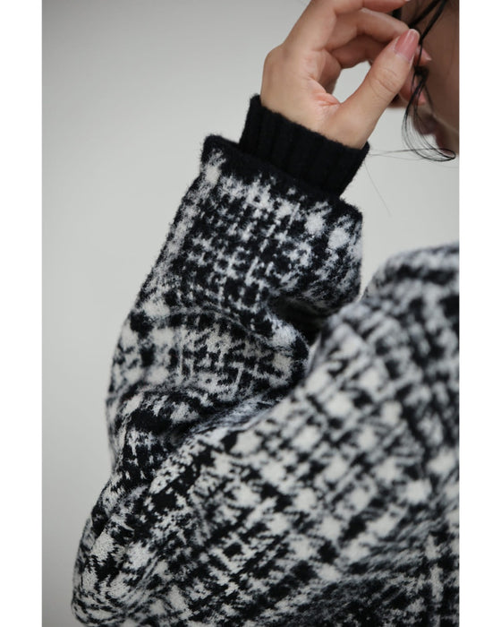 重ね着風な手元のチェックニットジャケット