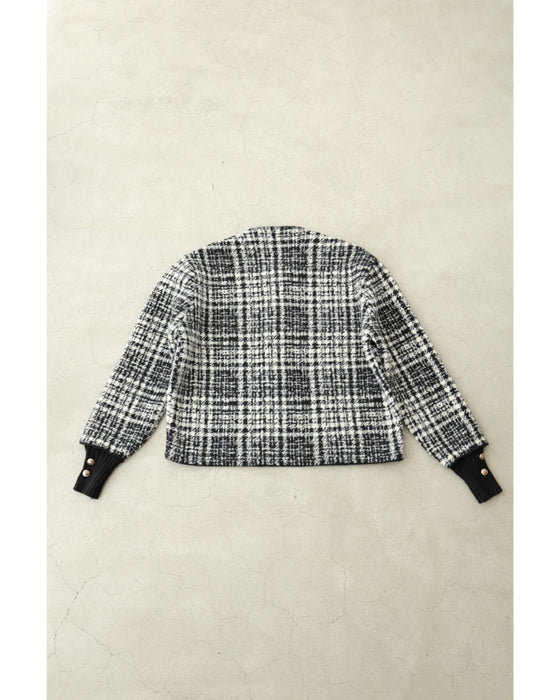 重ね着風な手元のチェックニットジャケット