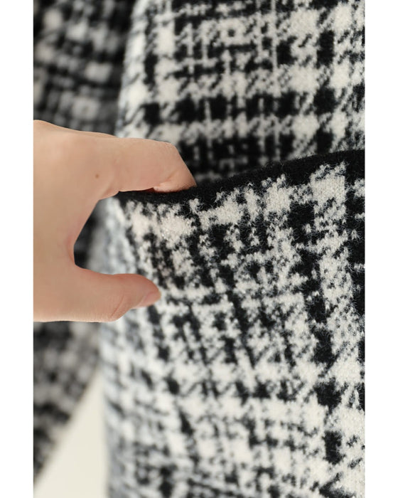 重ね着風な手元のチェックニットジャケット