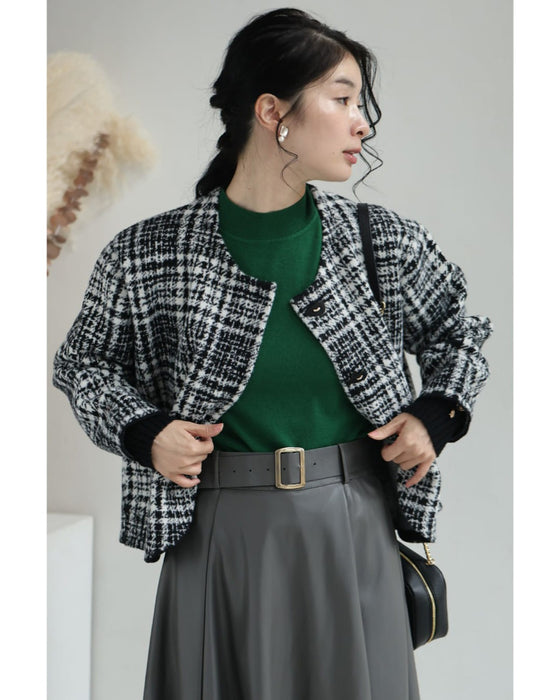 重ね着風な手元のチェックニットジャケット