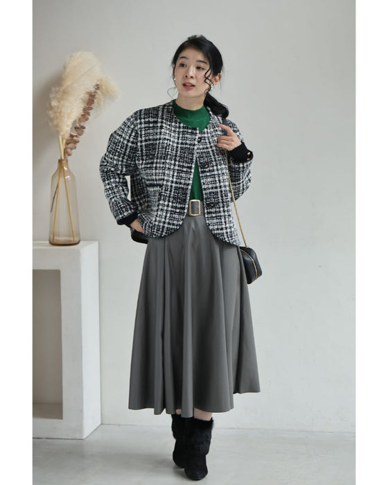 重ね着風な手元のチェックニットジャケット