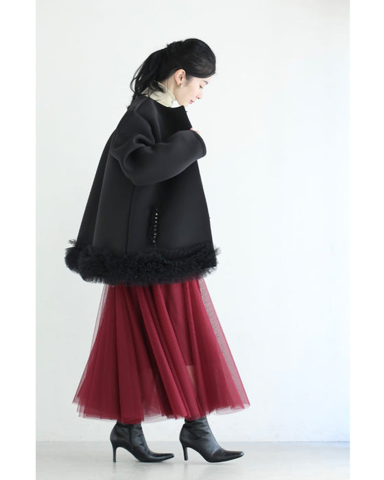 裾に咲くふわふわチュールのダンボール素材コート