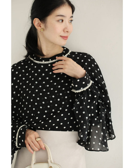 流れるフレアのドットブラウストップス