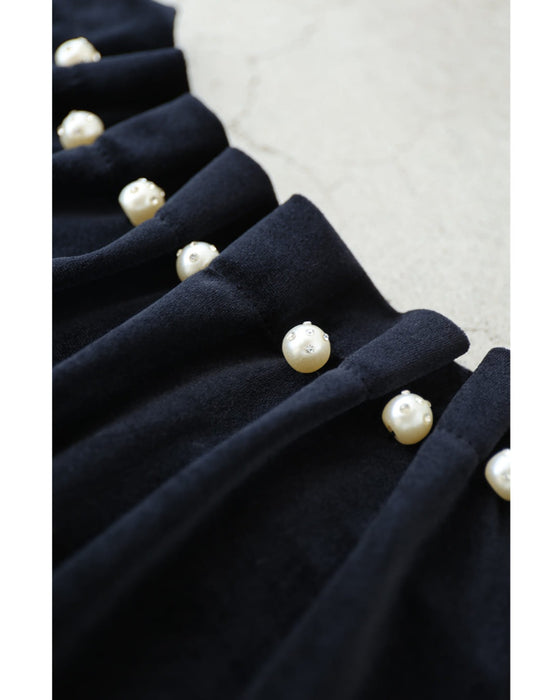パールを飾ったタックネックのベロアプルオーバートップス