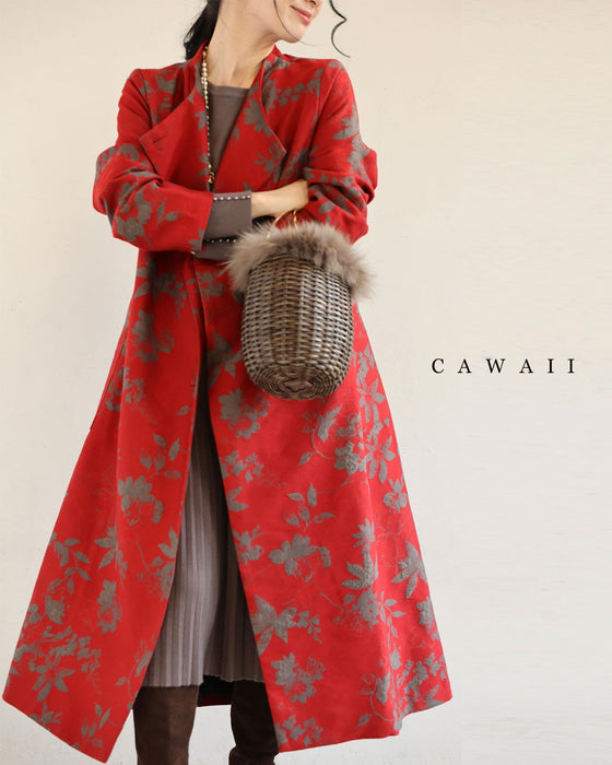 葉っぱのシルエット浮かぶ映える赤のロングコート(リボンベルト付)