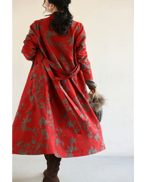葉っぱのシルエット浮かぶ映える赤のロングコート(リボンベルト付)