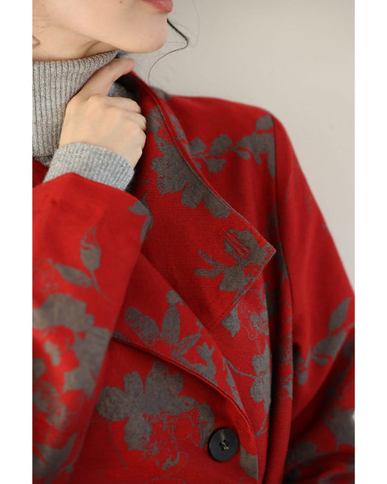 葉っぱのシルエット浮かぶ映える赤のロングコート(リボンベルト付)