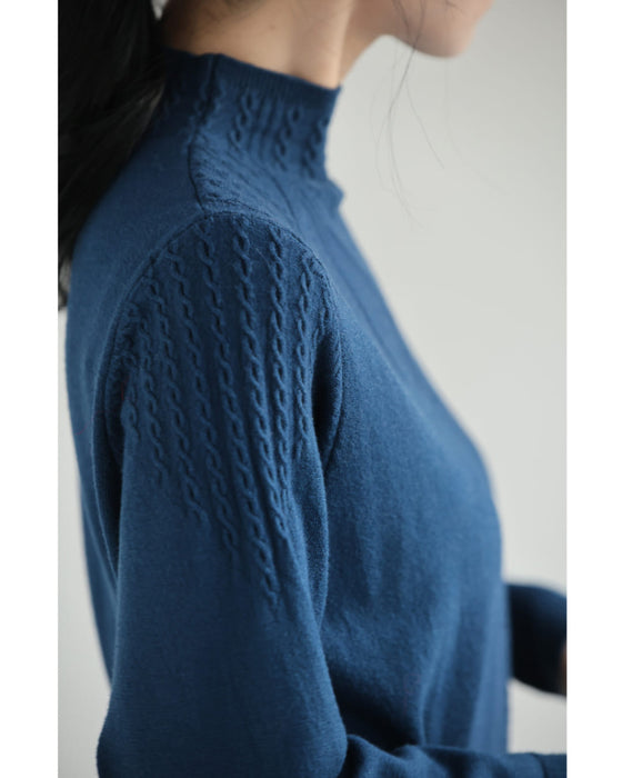 浮かびあがる装飾柄Aラインニットチュニック