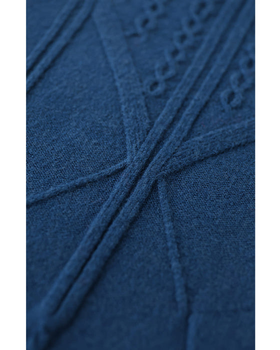 浮かびあがる装飾柄Aラインニットチュニック