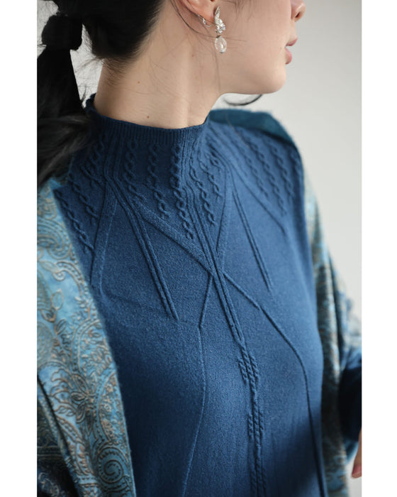 浮かびあがる装飾柄Aラインニットチュニック