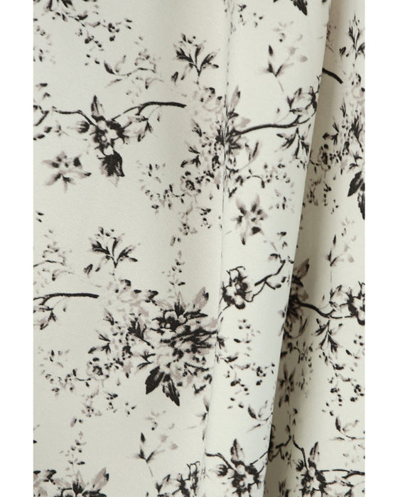 裾に広がる花柄の重ね着風スウェットロングワンピース