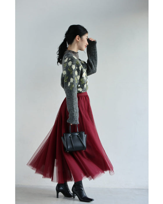 浮き立つ花コサージュの起毛ニットカーディガン