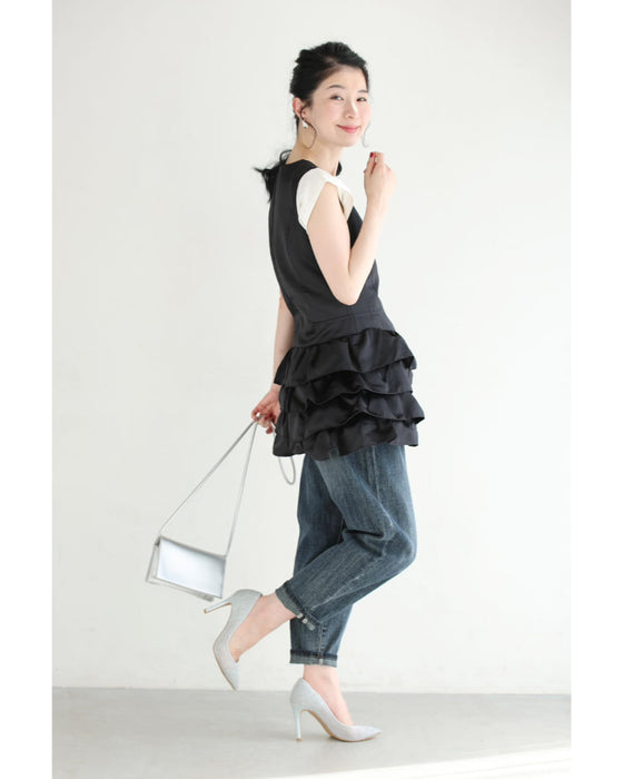 リボンを添えた重なるフリルチュニック