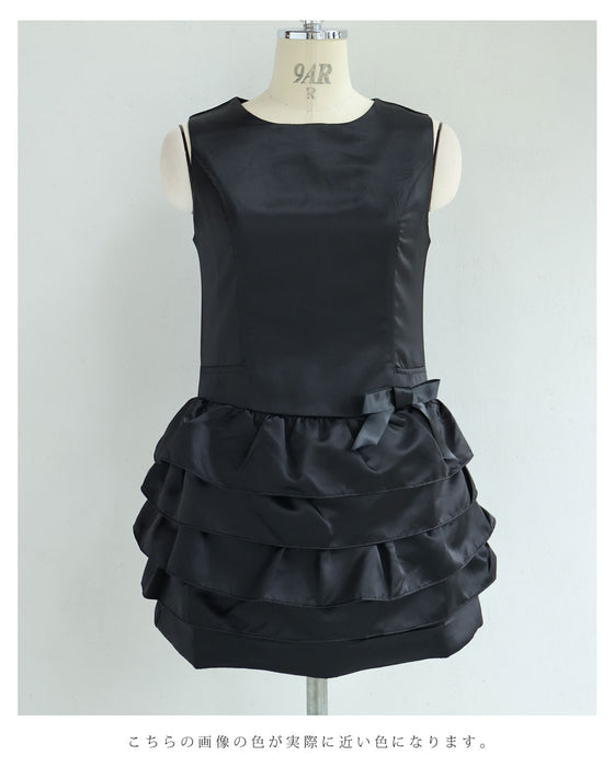 リボンを添えた重なるフリルチュニック