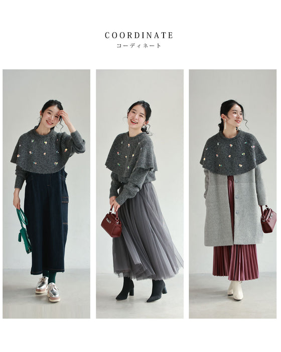 虹色の輝き放つオーロラスパンコールのケープニットプルオーバートップス