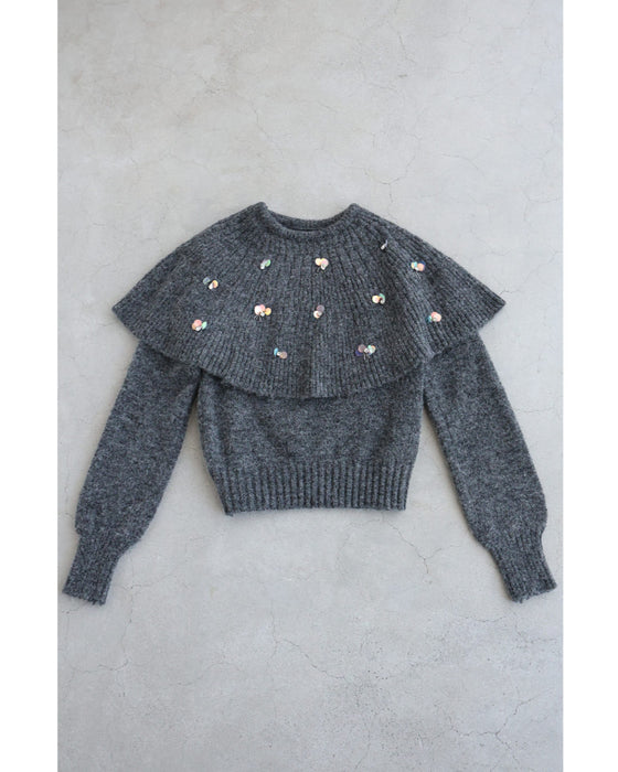 虹色の輝き放つオーロラスパンコールのケープニットプルオーバートップス