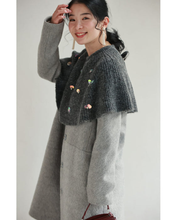 虹色の輝き放つオーロラスパンコールのケープニットプルオーバートップス