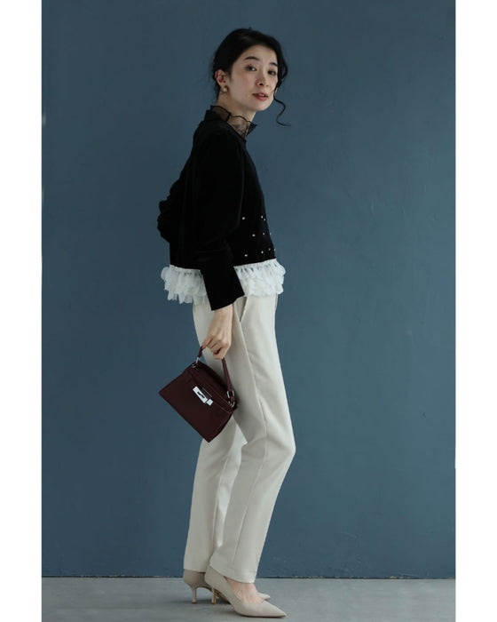 裾に広がるサークルフリルのベロア調ビジュープルオーバートップス