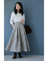 優美な曲線描く花柄ジャガードミディアムスカート
