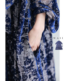  エレガントなフロッキー加工の柄浮かぶネックタイロングワンピース(ベルト付き)