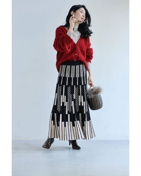 幾何学柄山折りプリーツニットのロングスカート