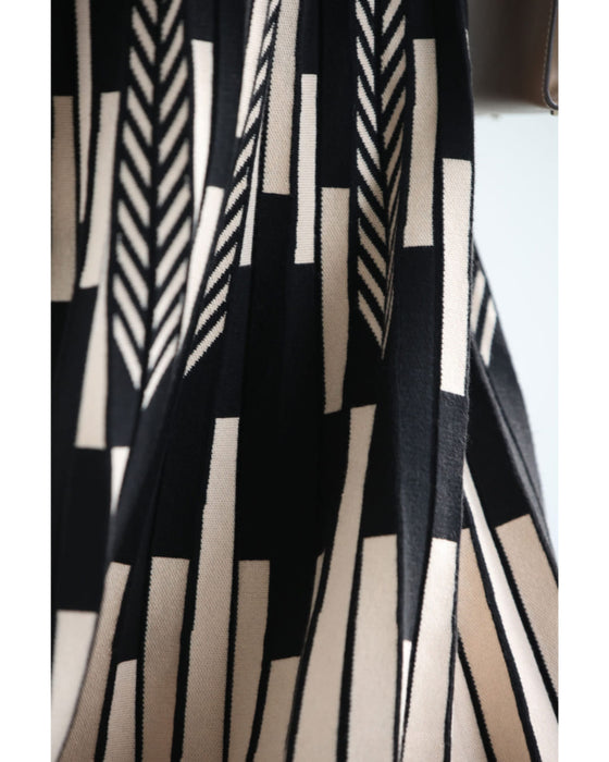 幾何学柄山折りプリーツニットのロングスカート