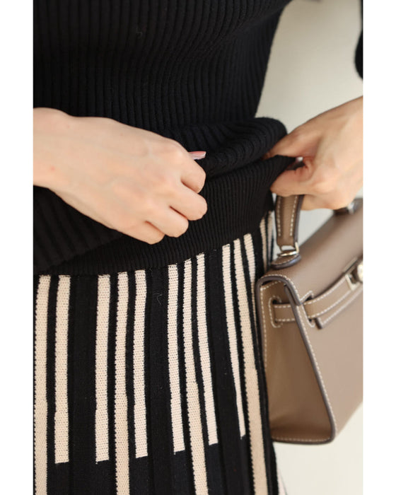 幾何学柄山折りプリーツニットのロングスカート