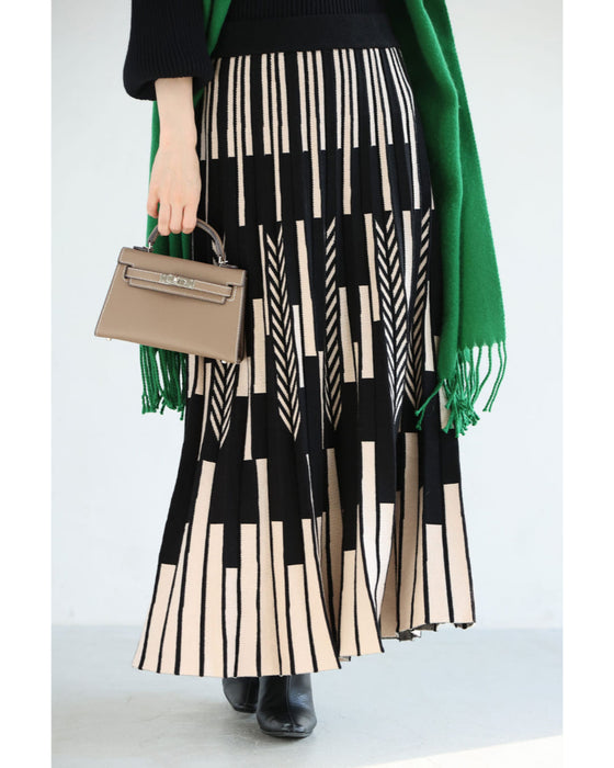 幾何学柄山折りプリーツニットのロングスカート