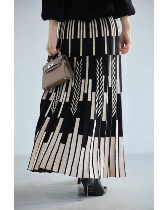 幾何学柄山折りプリーツニットのロングスカート