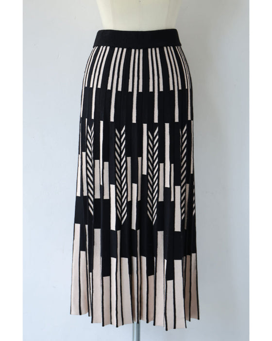 幾何学柄山折りプリーツニットのロングスカート