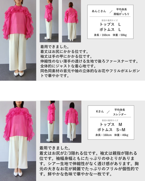 一輪のバラを抱く流れるフリルのシアーブラウストップス