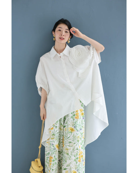 ロゼット風の花咲くフィッシュテールシャツトップス