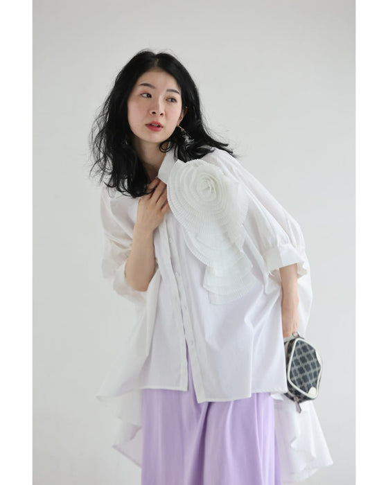 ロゼット風の花咲くフィッシュテールシャツトップス