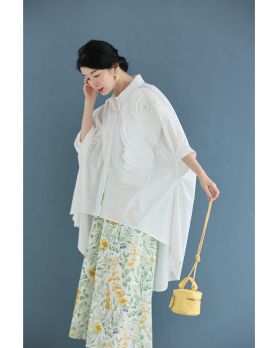 ロゼット風の花咲くフィッシュテールシャツトップス