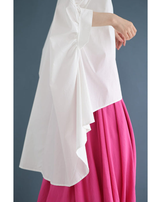 ロゼット風の花咲くフィッシュテールシャツトップス