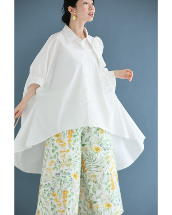 ロゼット風の花咲くフィッシュテールシャツトップス