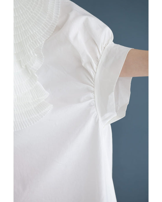 ロゼット風の花咲くフィッシュテールシャツトップス