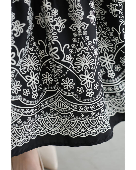 装飾柄ティアードミディアムワンピース（紐リボン付き）