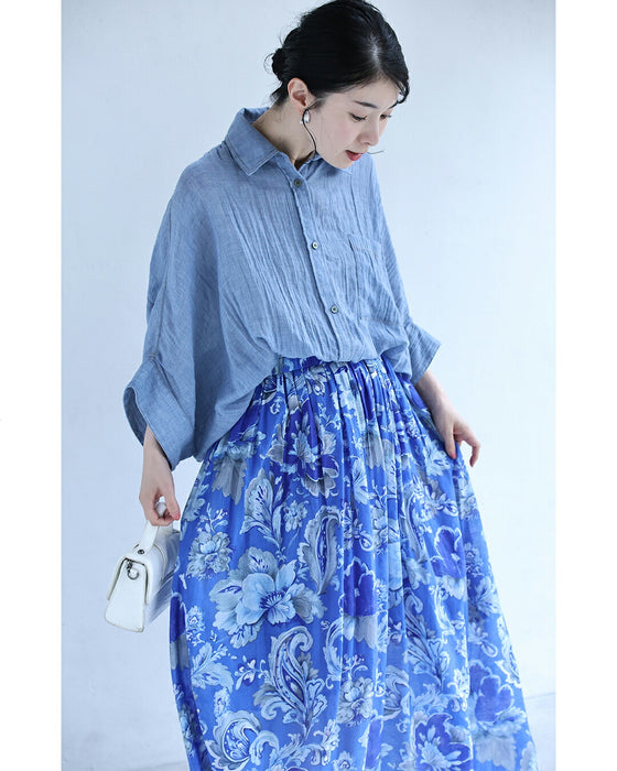 柔らかく揺らめく青の花画ロングスカート