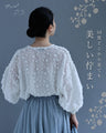 枝垂れる花のロング丈ブラウストップス