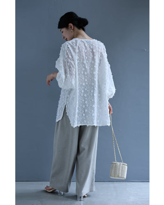 枝垂れる花のロング丈ブラウストップス