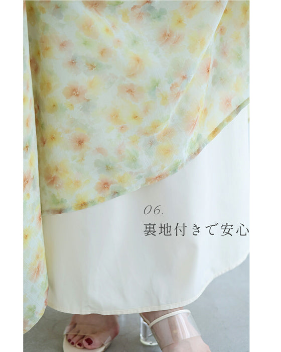 胸元に咲く花のほんのりパステルフラワーロングワンピース