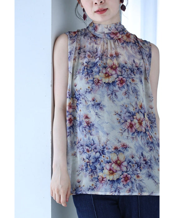後ろで揺れるリボンの花画シフォンブラウストップス